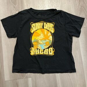 Small navy blue tee - sits right at hip line